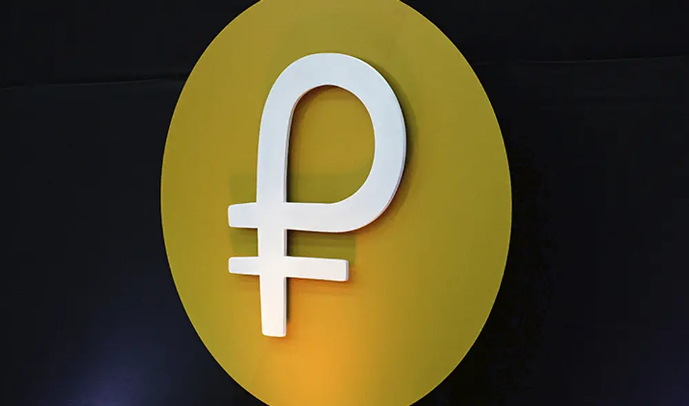 Chequea el valor del petro, la criptomoneda implementada por el Gobierno de Nicolás Maduro en Venezuela. Foto: AFP Chequea el valor del petro, la criptomoneda implementada por el Gobierno de Nicolás Maduro en Venezuela. Foto: AFP