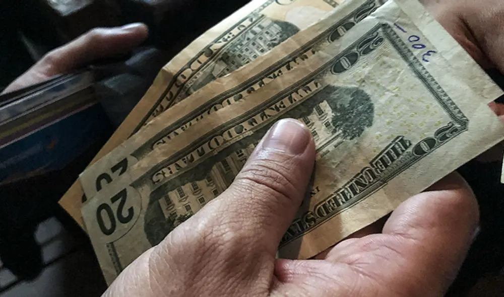 Precio del dólar BCV hoy, 21 de marzo de 2022, en Banco Central de Venezuela: tasa del dólar oficial. Foto: AFP