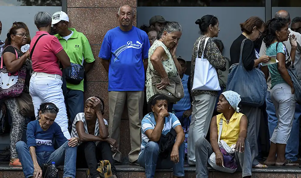 Este lunes 21 de abril de 2022, inicia el pago de la pensión en Venezuela. Conoce los detalles del nuevo aumento de salario. Foto y Video: AFP Este lunes 21 de abril de 2022, inicia el pago de la pensión en Venezuela. Conoce los detalles del nuevo aumento de salario. Foto y Video: AFP