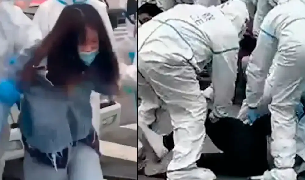 Policías vestidos con trajes para materiales peligrosos reprimieron a los residentes de un edificio que se negaban a desalojar sus hogares. Foto y video: captura de Infobae