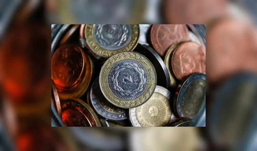 Una persona que desee cambiar pesos argentinos en alguna de las muchas casas de cambio que hay repartidas por el centro de Madrid se encontrará con que ninguna o al menos casi ninguna de ellas acepta pesos, revela Cinco Días. Foto: EFE