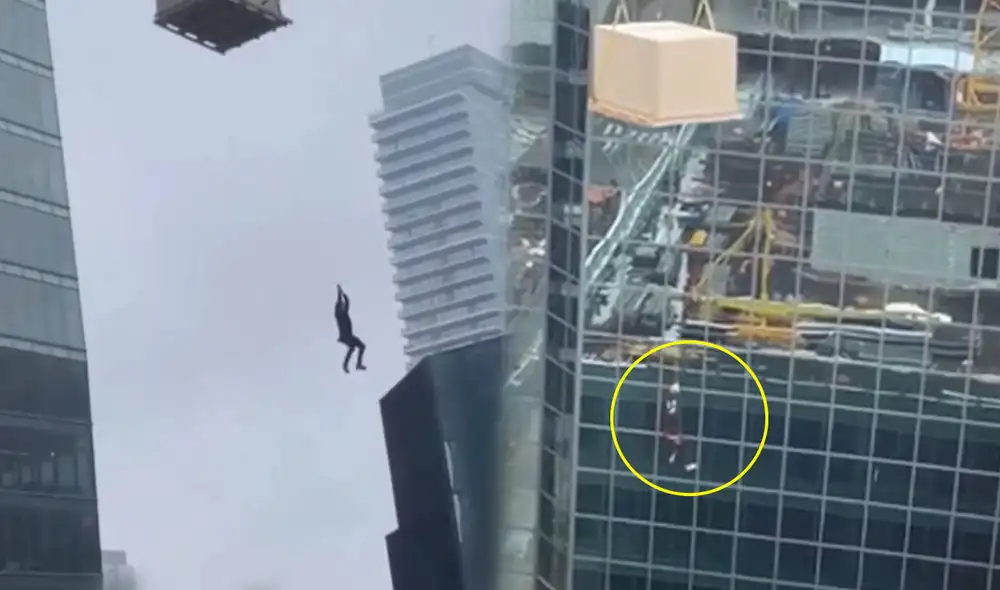 El obrero quedó en el aire a varios metros de altura. Afortunadamente no sufrió lesiones. Foto: captura/Clarin El obrero quedó en el aire a varios metros de altura. Afortunadamente no sufrió lesiones. Foto: captura/Clarin