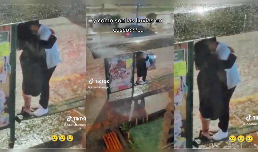 Pareja bajo la intensa lluvia de Cusco. Foto y video: @joseluisvegacc.