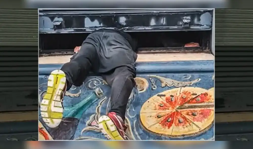 El delincuente se quedó atorado por la pesada ventana en Rosario, Argentina. Foto:  Telefe Rosario