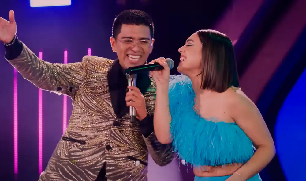 Christian Yaipén y Ángela Leiva unieron sus voces en el aniversario del Grupo 5. Foto: YouTube/Grupo 5