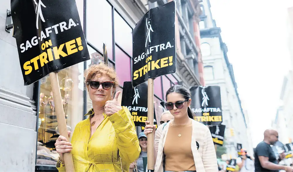 Protestas. Kevin Bacon y Susan Sarandon al iniciar la huelga. Foto: AFP