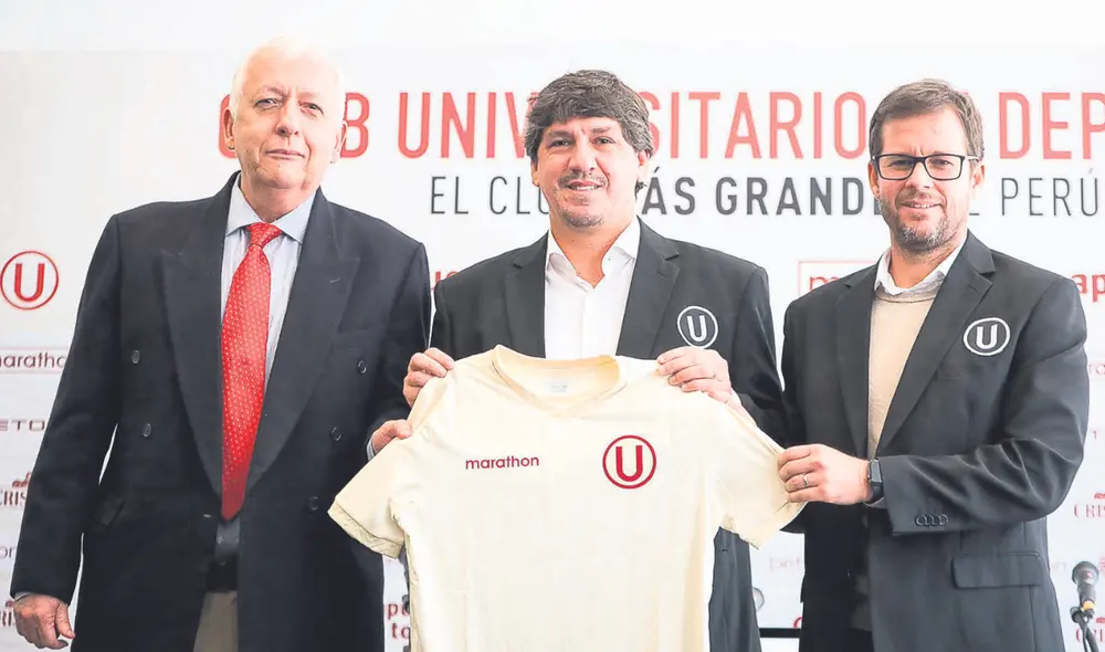 Viste de crema. Jean Ferrari y Manuel Barreto presentaron al exgerente de la Bicolor como nueva incorporación crema. Foto: difusión Viste de crema. Jean Ferrari y Manuel Barreto presentaron al exgerente de la Bicolor como nueva incorporación crema. Foto: difusión