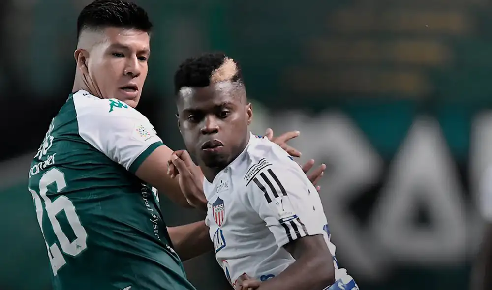 Los hinchas de Deportivo Cali trataron de agredir al árbitro por un gol anulado. Foto: Junior FC