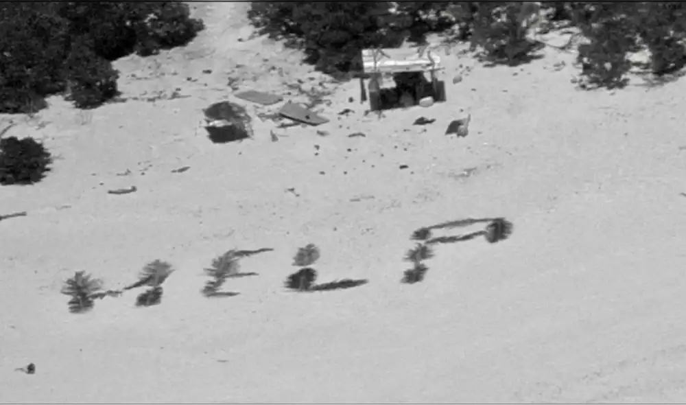 Náufragos usaron hojas de palmera para recibir ayuda. Foto: Efe