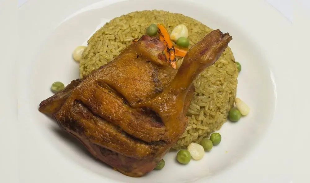 Arroz con pato es el plato bandera de Sudamérica. Foto: Andina