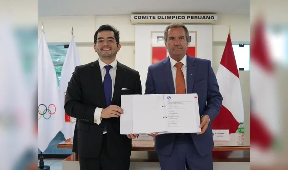 El presidente del COP, Renzo Manyari, junto a Neven Ilic , presidente de Panam Sports, muestran el contrato firmado El presidente del COP, Renzo Manyari, junto a Neven Ilic , presidente de Panam Sports, muestran el contrato firmado