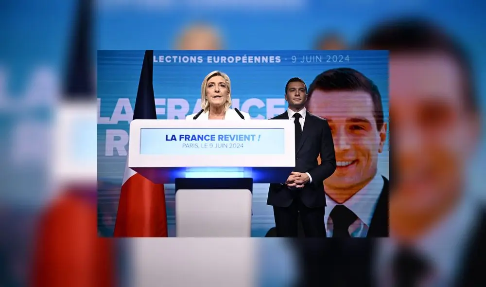 Marine Le Pen (izq.), líder del partido francés de extrema derecha RN, se dirige a los militantes después del anunció de las nuevas elecciones generales el 30 de junio.