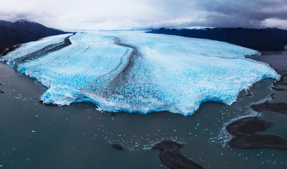 El avance del glaciar Pío XI está relacionado con factores climáticos y geológicos, como el aumento de precipitaciones y la acumulación de nieve. Foto:  Ladera Sur/Adam Spencer.