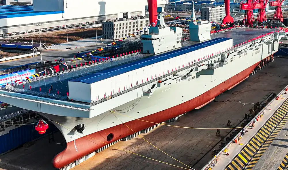 El Tipo 076 se distingue por su superestructura de dos islas y una cubierta de vuelo de longitud completa. Foto: Captura CNN.