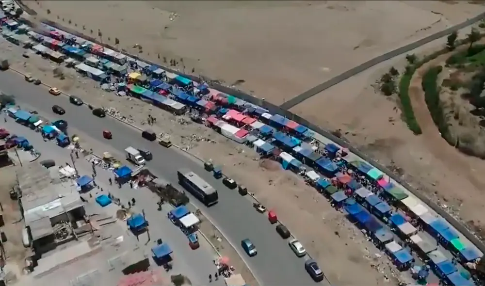 . Personal de la Municipalidad de Villa El Salvador también se sumó a los trabajos, quienes colocaron rejas a lo largo de la avenida Pastor Sevilla y Mariategui. Foto: captura/América TV . Personal de la Municipalidad de Villa El Salvador también se sumó a los trabajos, quienes colocaron rejas a lo largo de la avenida Pastor Sevilla y Mariategui. Foto: captura/América TV