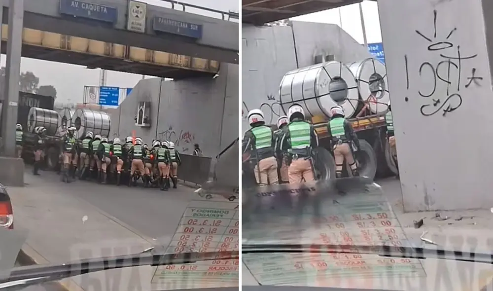 Policías intentan mover un tráiler con carga