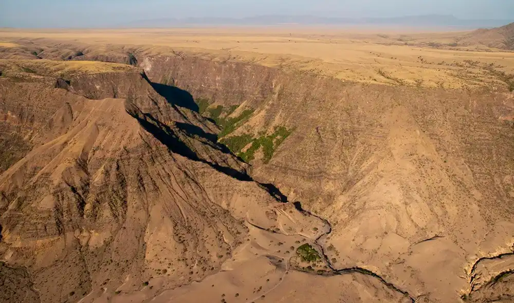 Vista aérea de un desfiladero en el Valle del Rift de África Oriental, en Engaruka, Tanzania. Foto: Ulrich Doering/Alamy Vista aérea de un desfiladero en el Valle del Rift de África Oriental, en Engaruka, Tanzania. Foto: Ulrich Doering/Alamy