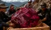 Hallado en la región de Mogok, destaca por su color rojo púrpura con matices amarillos. Se estima que alcanzará un valor millonario gracias a su pureza y calidad cromática.