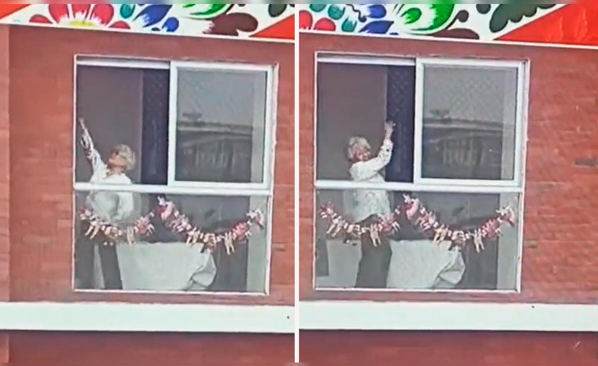 Gran Desfile Militar: adulta mayor baila marinera desde la ventana de ...