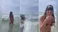 Intenta tomarse una foto en la playa, pero una fuerte ola arruina sus planes y la revuelca