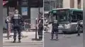 Policías detienen el tránsito para que familia de patos cruce la calle sin peligro