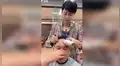 Joven hace un fuerte estornudo mientras barbero le corta el cabello y termina así [VIDEO]