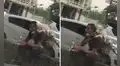 Vendedor ambulante comparte su comida con el perrito que lleva en la espalda