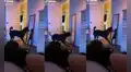 Perrito ve su reflejo en un espejo y salta asustado hacia su dueño para refugiarse