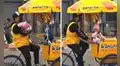 Heladero conmueve en redes al trabajar y cuidar a su pequeña hija al mismo tiempo