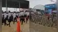 Escolares participan en desfile por Fiestas Patrias en plena lluvia y evento genera debate en redes 