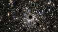 Todos podríamos vivir dentro de un agujero negro, según científicos: estaría vinculado con la rotación de galaxias