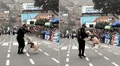 Policía roba la atención en desfile de El Agustino al hacer saltar a su perro entrenado