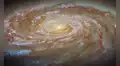 El telescopio Hubble captura una galaxia siendo despojada lentamente de su futuro por poderosas fuerzas cósmicas