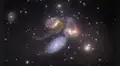 Astrónomos captan la fusión de 6 galaxias para formar una de las megaestructuras más grandes del universo