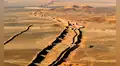 Al construir 2700 km de muros de arena en pleno desierto entre 1980 y 1987, Marruecos dividió literalmente el Sahara Occidental en dos