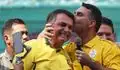 Jair Bolsonaro celebra la ventaja de su hijo Flávio frente a Lula antes de la segunda vuelta en Brasil