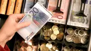 Euro alcanza su valor mínimo frente al dólar luego de que la Fed elevara la tasa de interés