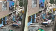 Captan cómo 2 recicladores se lanzan de segundo piso en medio de una discusión
