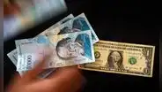 Maduro otorga bonos a venezolanos y no llegan a un dólar
