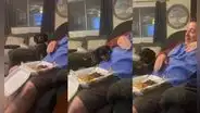 Perrita no deja que el dueño de las costillas a la barbacoa se acerque a ellas
