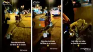 Perrito camina al lado de su dueño mientras lo ‘ayuda’ en su trabajo