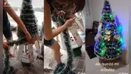 Mujer se las ingenia para armar un árbol navideño casero con cartón y guirnaldas