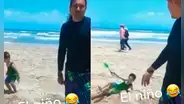 Artista hace un cocodrilo de arena en la playa, pero niño llega y lo destruye