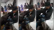 Perro ‘aprovecha’ que hombre se quedó dormido en fiesta para lamerle la cara
