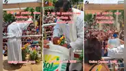 Sacerdote bendice a feligreses, pero ante intenso calor termina lanzando baldes de agua