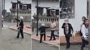 Señora pasea por las calles con su bastón mientras lanza espuma a todos durante carnaval