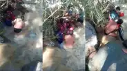 Mujer es rescatada de morir tras intentar cruzar una quebrada en motocicleta