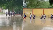 Escolares piuranos cruzan calles inundadas de agua y lluvias siguen afectando colegios