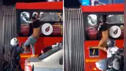 Ladrón intenta robar a pasajeros y queda colgado en la ventana de un bus en Colombia