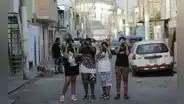 Pequeños fotógrafos de un barrio picante